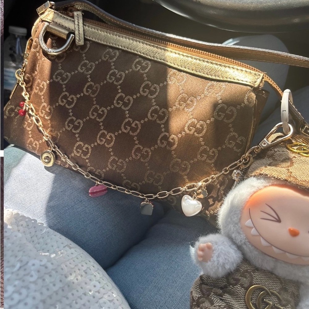 Gucci satin monogram D ring metallic bronze cosmetic bag